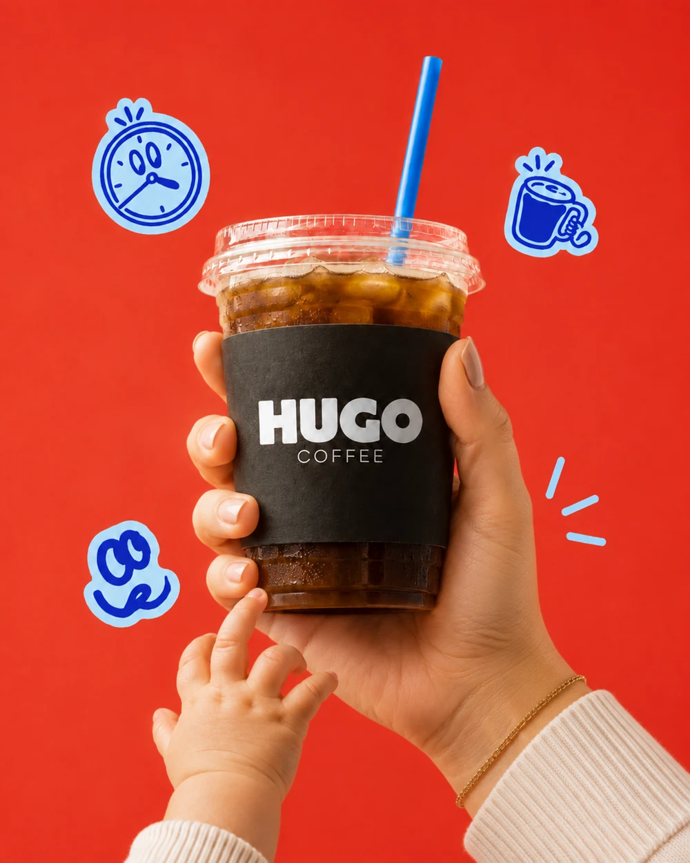 A little hand reaching for a Hugo cup
